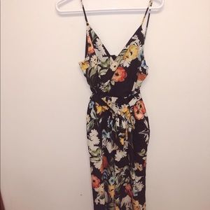 Floral tank jumpsuit with pockets and tie belt